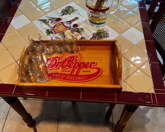 Vintage dining room table.  Tile wine motif