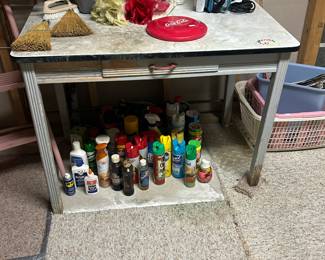 Metal top antique table and cleaning supplies 