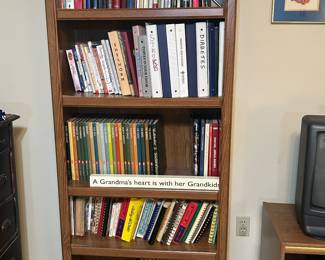 Two matching bookcases and lots of books