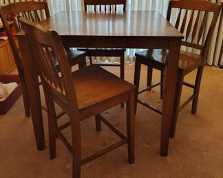 high top table with 4 chairs