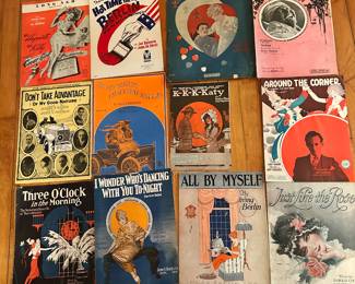 Very colorful sheet music covers.