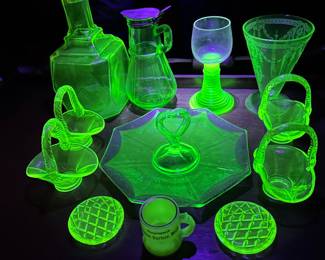 Excellent examples of the uranium in the Vaseline Glass pieces. at the sale. 