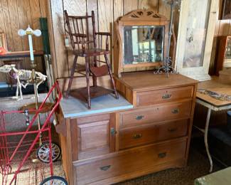 Marble topped dresser with mirror, child's high chair