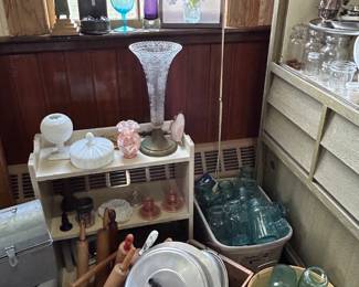 Blue canning bottles, rolling pins, wood boxes