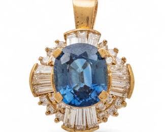 Lot 63
4.85ct Sapphire , Diamond, And 14k Yellow Gold Pendant H 0.75" 6 g