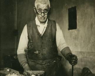 Lot 4015
Black and White Print on Paper, 'Craftsman in His Workshop', H 5" W 4.75" Frame Size: H 13.5" W 10.5"