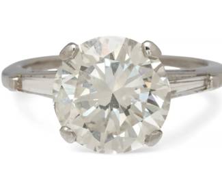 Lot 21
3.8 Carat Round Brilliant Diamond And Platinum Ring Size 5.5