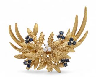 Lot 19
14K Yellow Gold Diamond & Sapphire Floriform Brooch 1960, W 2" 16 g 1 PC
