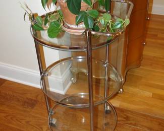 Three level glass and chrome table