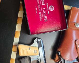 Smith and Wesson 22 Revolver-There is a stipulation with these 2 guns, stop by or contact us for the specifics thank you. And A Galesi Italian Pistol