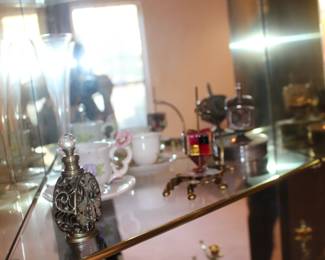 Perfumes, Cups and Saucers
