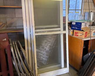 Glass doors . Folding chairs