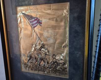 Flag raising Iwo Jima on pounded metal