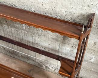 This lot features a Victorian three-tier wall shelf that measures, 25.5” H x 32” W x 6.5” D.
