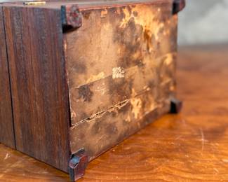 This lot features a stunning antique wooden box in good overall condition that measures, 4.75” H x 8” W x 6” D.
