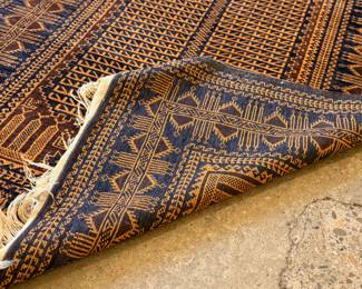This lot features a Baluch prayer rug in very good condition. This rug was gifted by a Saudi Arabian official as a gesture of thanks for his time as Consul General during a social engagement. This Baluch rug measures, 78” H x 47” W. 
