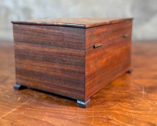 This lot features a stunning antique wooden box in good overall condition that measures, 4.75” H x 8” W x 6” D.
