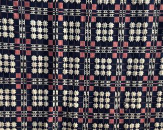 This lot features an incredible 19th century Welsh double-cloth "tapestry" blanket, with the iconic Caernarfon pattern. This design is one of the most recognizable traditional Welsh patterns, dating back to the early 19th century. This item can be used as a rug, blanket, hung as a work of art, or however you’d like to display and use it. Minor holes throughout, but in good overall condition for its age. This piece measures, 84” H x 74” W.
