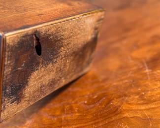 This lot features an antique English double tea caddy, likely Georgian and measures, 4.5” H x 7.25” W x 4.25” D. Tea caddies were popular in the 18th and 19th centuries when tea was a valuable commodity.
