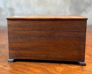 This lot features a stunning antique wooden box in good overall condition that measures, 4.75” H x 8” W x 6” D.
