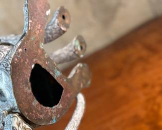 This lot features a stunning antique Chinese cloisonné sculpture of a Dalmatian dog. The tail is barely holding on as shown in photos, but is complete and a stunning sculpture. This Dalmatian measures, 14.5” H x 7” W x 9.5” D.
