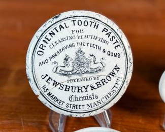 This lot features three (3) Victorian toothpaste ceramic pots & lids, circa 1800s. Made in England, included you’ll find "Cherry Toothpaste" by John Cosnell & Co, "Oriental Toothpaste" by Jewsbury & Brown, and a rare Edwardian ironstone ointment pot.
