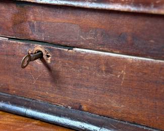 This lot features what appears to be a Victorian writing slope or lap desk. Locks and comes with the original skeleton key, with beautiful patina throughout. Please note, there is no "slope" and has a flat box surface inside. This stunning piece measures, 5” H x 14.5” W x 17.5” D.
