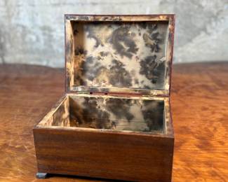 This lot features a stunning antique wooden box in good overall condition that measures, 4.75” H x 8” W x 6” D.
