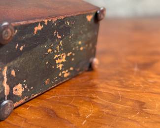 This lot features an antique English double tea caddy, likely Georgian and measures, 5.5” H x 8” H x 4.25” D. Tea caddies were popular in the 18th and 19th centuries when tea was a valuable commodity.
