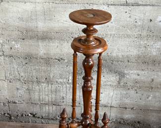 This lot features a Victorian carved mahogany torchere in excellent condition and measures, 37.25” H x 10” W x 10” D.

