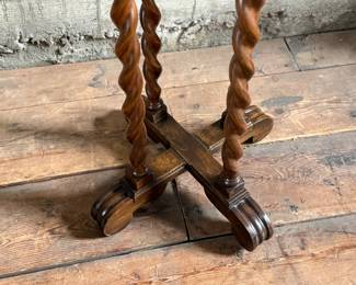 This lot features an antique solid wood barley twist fern stand in very good condition and measures, 32” H x 15.5” W x 15.5” D.
