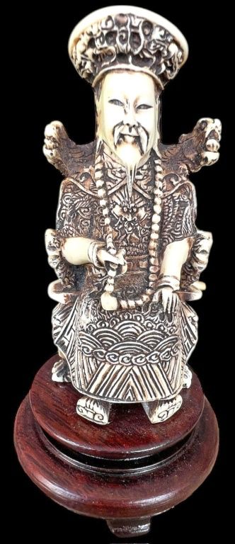 Carved Resin Chinese Emperor on Rosewood