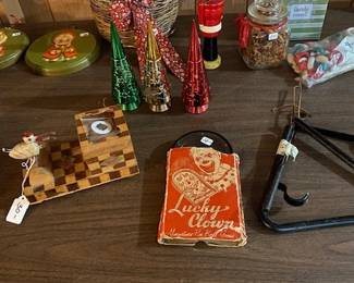 antique toys, hand forged wrought iron dinner bell triangle, mechanical cigarette dispenser, Avon bottles