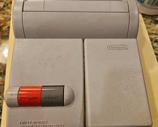 Very vintage Nintendo NES top loader ( plays all games) I was told $175