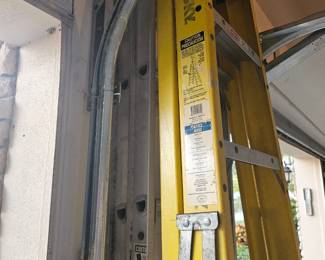 Fiberglass husky 8 ft tall a-framed ladder $80, 16 ft aluminum extension ladder $50