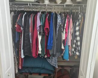 Closets full of clothing, shoes, wigs