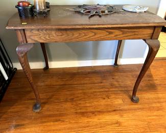 Queen Anne-style console or side table with cabriole legs and pad fee