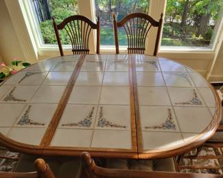 PRESALE ITEM - $225 SOLID OAK PEDESTAL TABLE AND 6 CHAIRS WITH TILE TOP AND LEAF.....PROFESSIONAL MOVING RESOURCE AVAILABLE......44" DIAMETER/WIDTH WITHOUT LEAF OR ADD 18" TO BECOME 62" L X 44" W