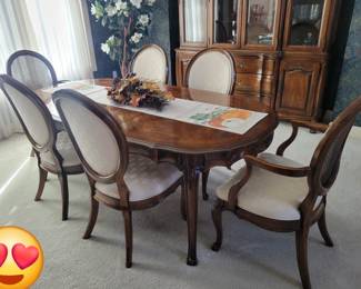 PRESALE ITEMS -CLASSIC AND TIMELESS - STUNNING FRENCH PROVENCIAL DINING ROOM SET WITH OVAL DINING TABLE, 8 CHAIRS AND LEAVES, LIGHTED CHINA CABINET AND BUFFET WITH DROP LEAF.  THE WHITE FURNITURE COMPANY KNOWN FOR THEIR QUALITY MADE SOLID WOOD FURNITURE FROM NORTH CAROLINA. EACH PIECE IS IN STUNNINGLY CRAFTED IN EXCELLENT CONDITION (6 SIDE CHAIRS $100 EACH, CAPTAIN CHAIRS $150 EACH TABLE WITH LEAF $300, LIGHTED CHINA CABINET $250, BUFFET WITH DROP LEAF $200) OR DISCOUNTED TO $1,500 IF PURCHASE ALL....PROFESSIONAL MOVING RESOURCE AVAILABLE