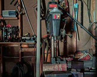 Workshop loaded with tools and equipment. 