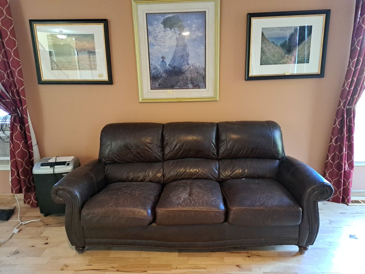 vintage leather sofa. Sofa is actually wine color. 