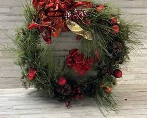 Large lighted Christmas Pine Wreath with Red Ribbon Bows Ornaments Pinecones and Berries