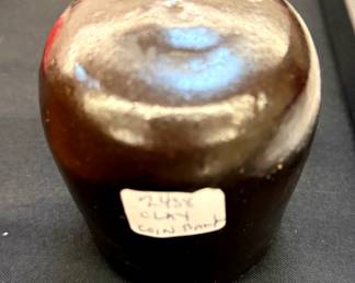 Filled Clay Coin Bank