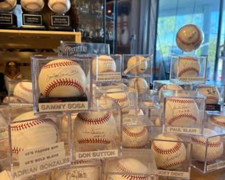 THEN AMOUNT OF SIGNED BASEBALLS IS INSANE