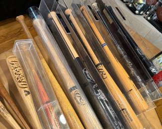 SO MANY SIGNED BATS