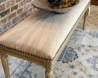 Bench with light pink/cream upholstery