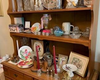 Several cabinets filled with collectables. 
