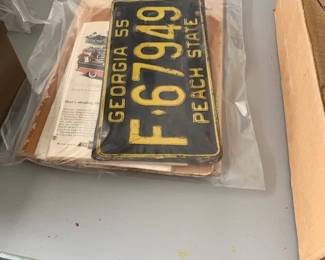 1955 Georgia tag along with 1955 Chevy advertising items.