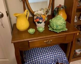 Super cute make up dresser. Peep the vintage items sitting on it.