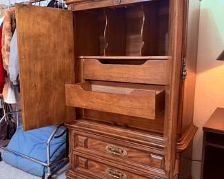 Armoire with cabinets and drawes